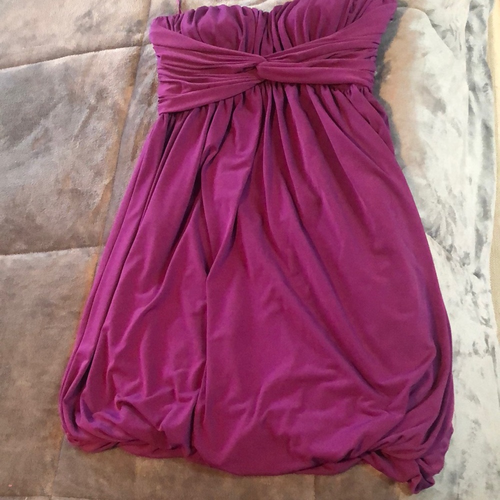 Jessica Simpson purple strapless dress with straps on the side.